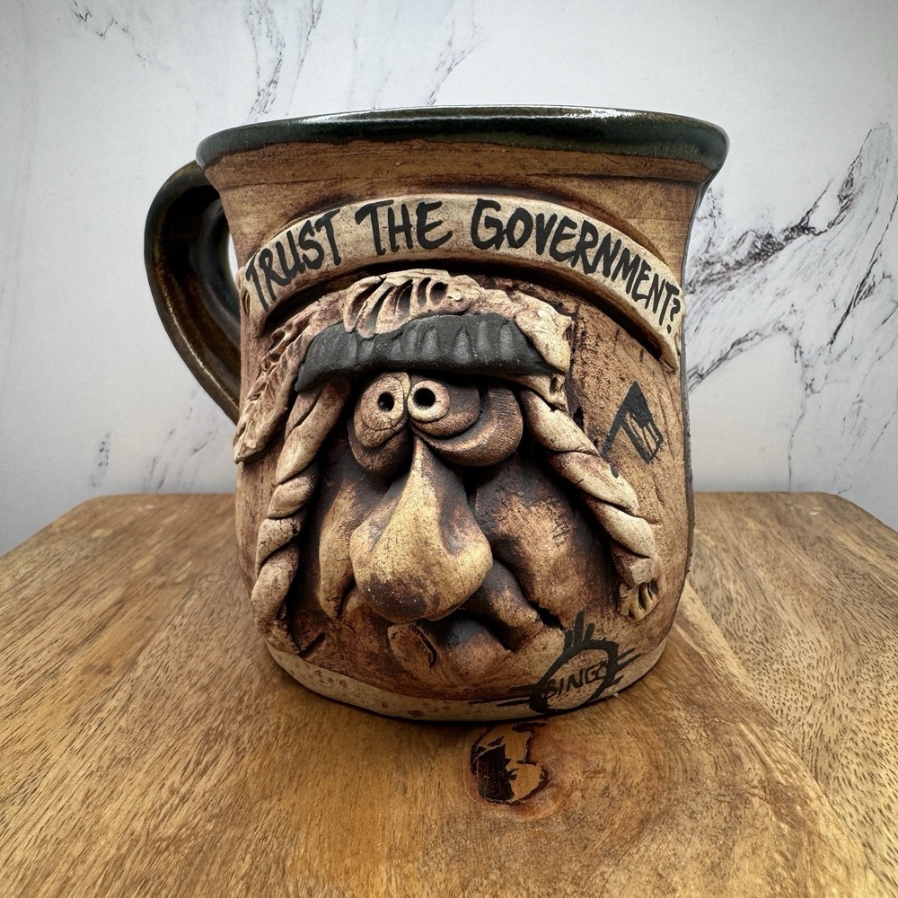 C. Sanger "Trust The Government?" Face Mug Signed 2000